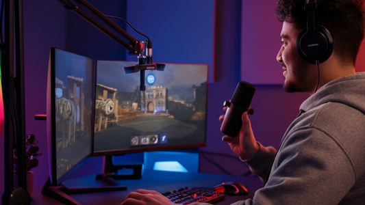 Streamer hosting gameplay while holding a microphone