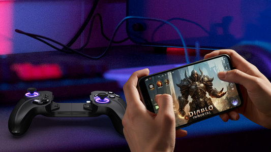 Playing Diablo Immortal with the Vagabond Mobile Gaming Controller at the table