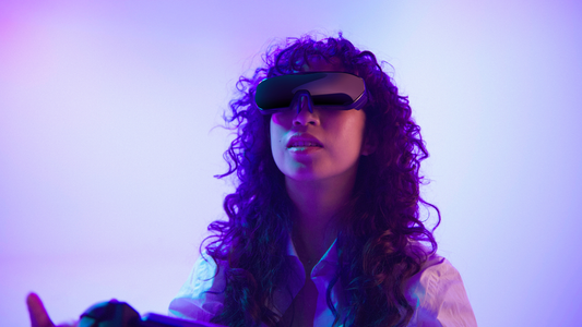 Gamer wearing Sentinel XR Glasses, fully immersed in a vibrant purple gaming environment