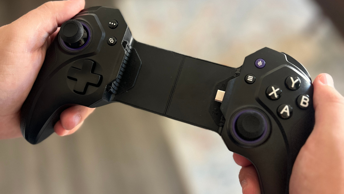 Holding a Vagabond Mobile Gaming Controller